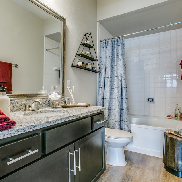 Essex House - Modern Bathroom with Granite Countertop